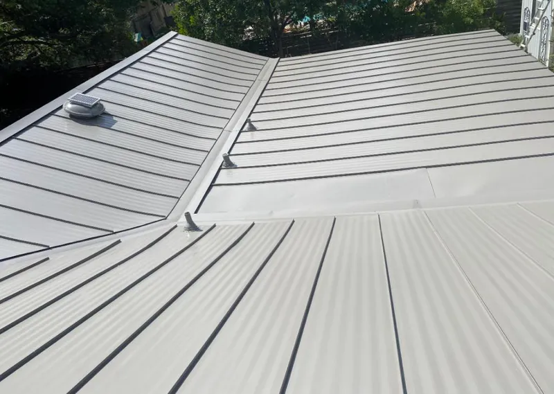 Solar attic fan installed on a metal roof for Roof Ventilation in Cape Canaveral